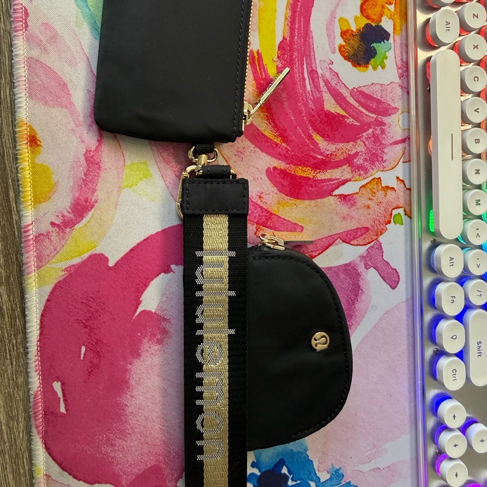 Lululemon Athletica Black Phone Pouch with Gold Accents